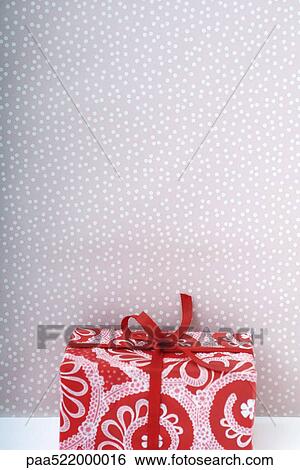 Brightly colored Christmas present View Large Photo Image Stock Photograph - Brightly colored Christmas present. Fotosearch