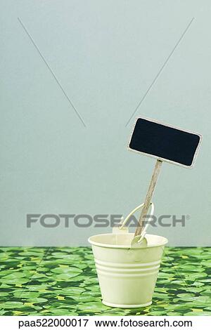 Stock Photo - Dessert bucket with decorative sign. Fotosearch