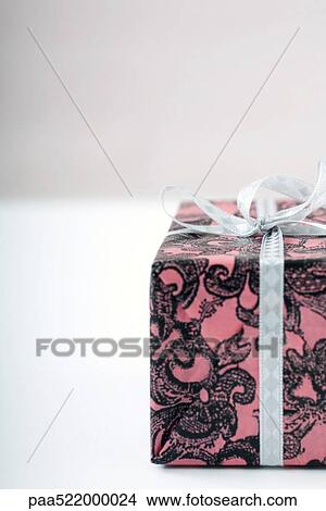 Detail of gift wrapped present View Large Photo Image Picture - Detail of gift wrapped present. Fotosearch