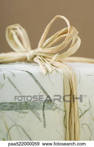 Stock Photo - Gift wrapped present, detail. Fotosearch