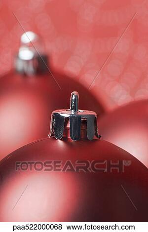 Several red Christmas tree ornaments View Large Photo Image Stock Photo - Several red Christmas tree ornaments. Fotosearch