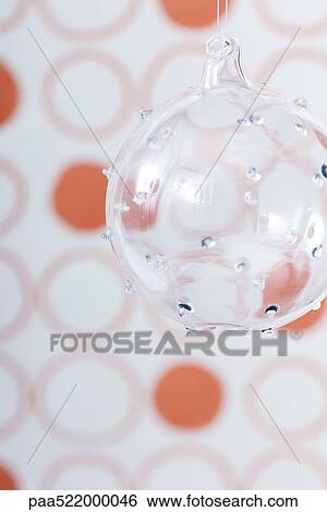 Solitary glass Christmas tree ornament View Large Photo Image Stock Photograph - Solitary glass Christmas tree ornament. Fotosearch