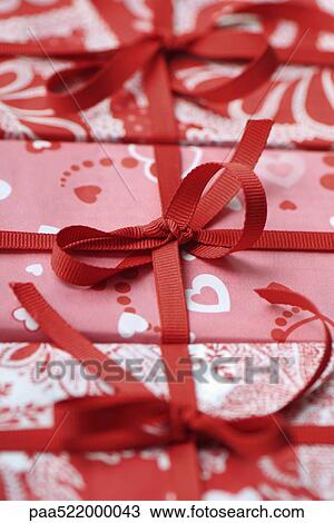 Three gift wrapped presents, cropped View Large Photo Image Stock Image - Three gift wrapped presents, cropped . Fotosearch