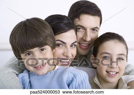 Portrait of family with two children, close-up View Large Photo Image Stock Image - Portrait of family with two children, close-up. Fotosearch