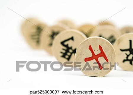 Chinese chess pieces, extreme close-up View Large Photo Image Stock Photo - Chinese chess pieces, extreme close-up. Fotosearch