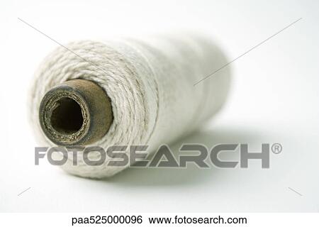 End of spool of string, close-up View Large Photo Image Stock Photograph - End of spool of string, close-up. Fotosearch