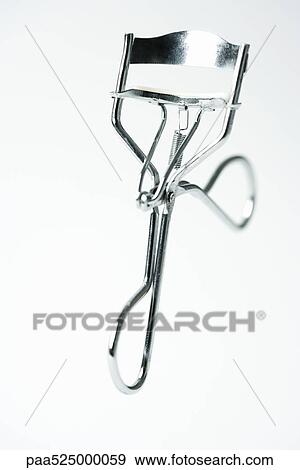 Eyelash curler, close-up View Large Photo Image Stock Photo - Eyelash curler, close-up. Fotosearch