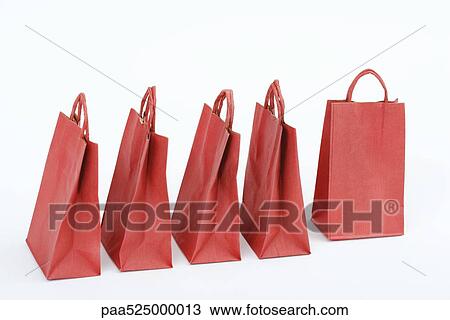 Five red shopping bags arranged side by side, one turned at right angle to others View Large Photo Image Stock Image - Five red shopping bags arranged side by side, one turned at right angle to others. Fotosearch