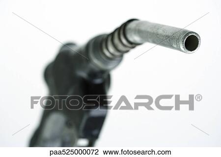 Stock Image - Gas pump nozzle, close-up. Fotosearch