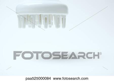 Hair dryer diffuser hovering in midair, close-up View Large Photo Image Picture - Hair dryer diffuser hovering in midair, close-up. Fotosearch