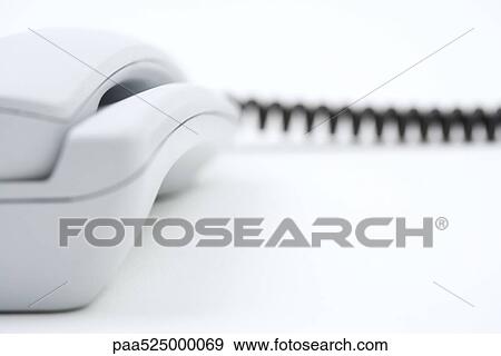 Stock Photo - Landline phone, extreme close-up. Fotosearch