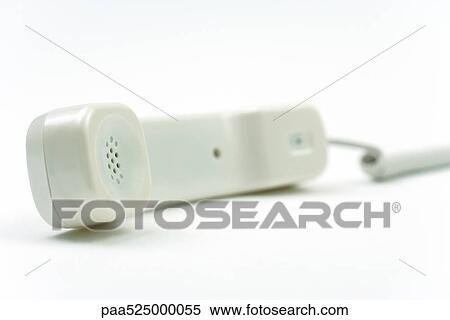 Landline phone receiver off the hook, resting on side View Large Photo Image Stock Photography - Landline phone receiver off the hook, resting on side. Fotosearch