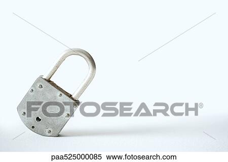 Metal padlock tilted to one side, close-up View Large Photo Image Stock Photography - Metal padlock tilted to one side, close-up. Fotosearch