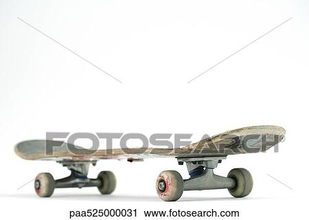 Stock Image - Much ridden skateboard, close-up. Fotosearch