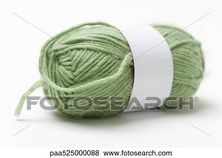 Skein of green yarn, close-up View Large Photo Image Stock Photo - Skein of green yarn, close-up. Fotosearch