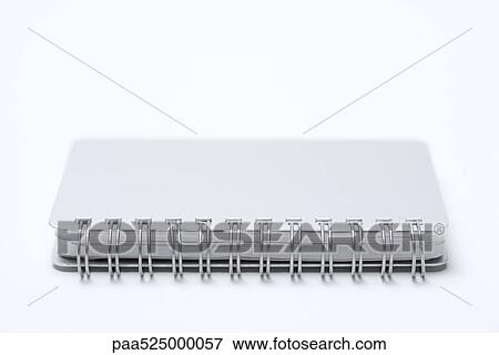 Stock Photo - Spiral notebook, close-up. Fotosearch