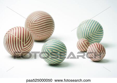 Striped rubber balls, still life View Large Photo Image Stock Image - Striped rubber balls, still life. Fotosearch