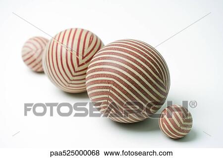Striped rubber balls, still life View Large Photo Image Stock Photo - Striped rubber balls, still life. Fotosearch