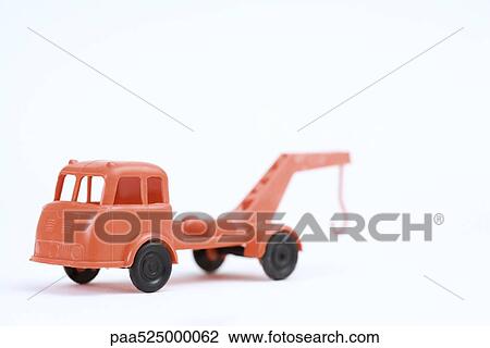 Toy tow truck, close-up View Large Photo Image Stock Image - Toy tow truck, close-up. Fotosearch