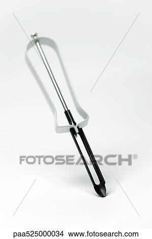 Picture - Vegetable peeler, close-up. Fotosearch