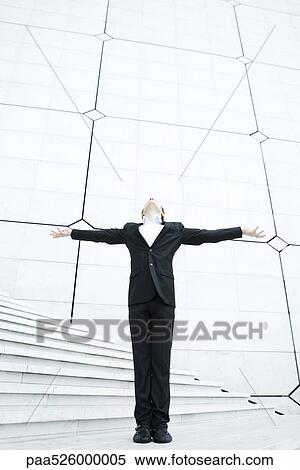 Business woman standing at foot of stairs with arms outstretched leaning back and looking up View Large Photo Image Stock Photography - Business woman standing at foot of stairs with arms outstretched leaning back and looking up. Fotosearch