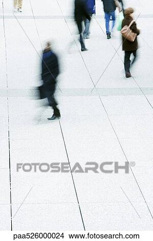 Pedestrians crossing public square View Large Photo Image Picture - Pedestrians crossing public square. Fotosearch