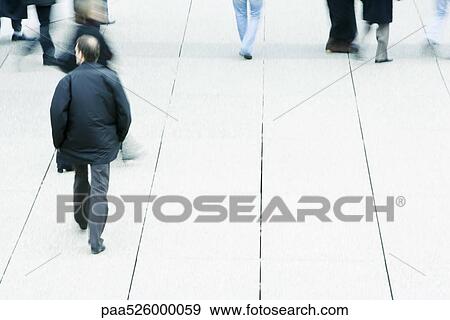 Pedestrians on sidewalk View Large Photo Image Stock Photo - Pedestrians on sidewalk. Fotosearch