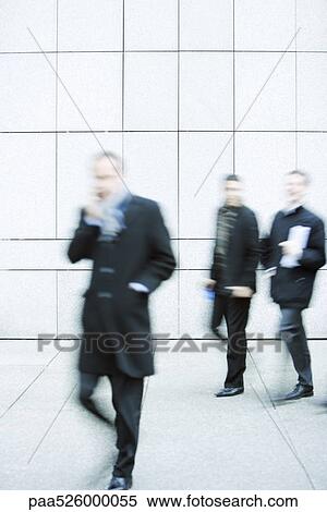Pedestrians on sidewalk View Large Photo Image Stock Photography - Pedestrians on sidewalk. Fotosearch