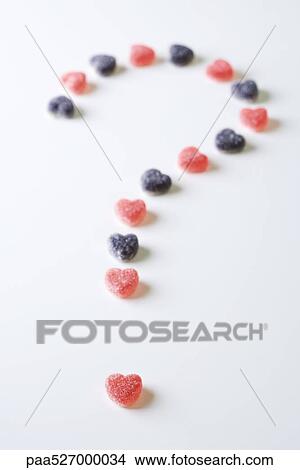 Candy hearts arranged in the shape of a question mark View Large Photo Image Picture - Candy hearts arranged in the shape of a question mark. Fotosearch