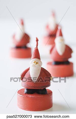 Santa Claus candles, focus on foreground View Large Photo Image Stock Image - Santa Claus candles, focus on foreground. Fotosearch