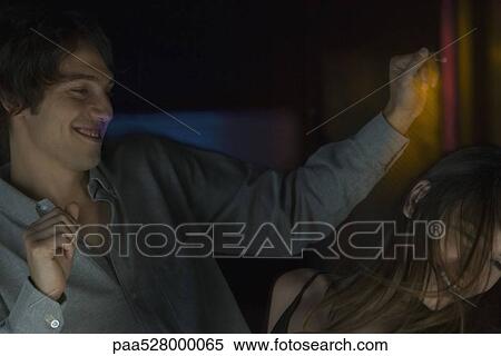 Couple dancing in the dark, blurred motion View Large Photo Image Stock Photography - Couple dancing in the dark, blurred motion. Fotosearch