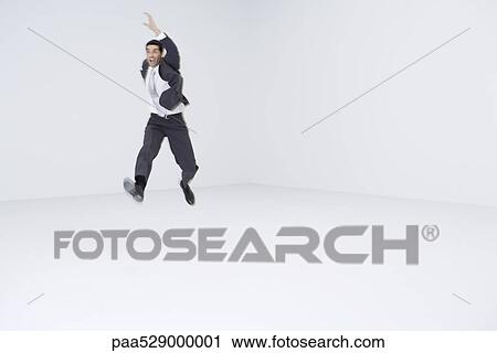 Businessman leaping View Large Photo Image Stock Image - Businessman leaping. Fotosearch