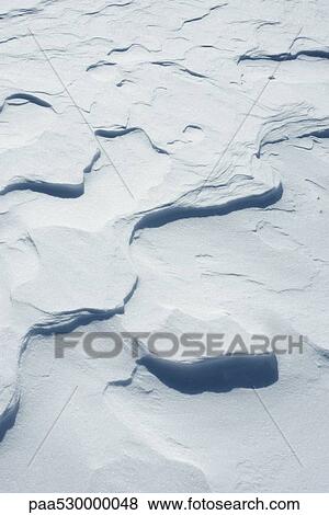 Wind-swept snow View Large Photo Image Stock Photo - Wind-swept snow. Fotosearch