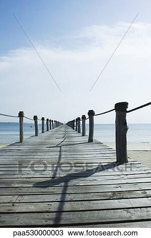 Wooden pier, Zanzibar, Tanzania View Large Photo Image Stock Image - Wooden pier, Zanzibar, Tanzania. Fotosearch