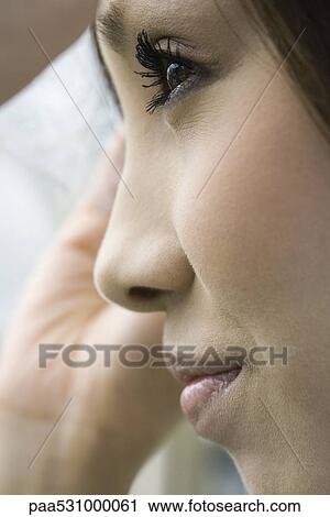 Female looking away in profile, extreme close-up View Large Photo Image Stock Image - Female looking away in profile, extreme close-up. Fotosearch