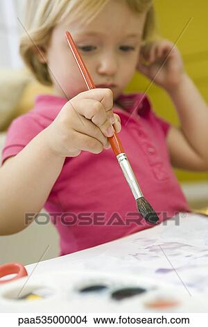 Toddler girl painting View Large Photo Image Picture - Toddler girl painting. Fotosearch