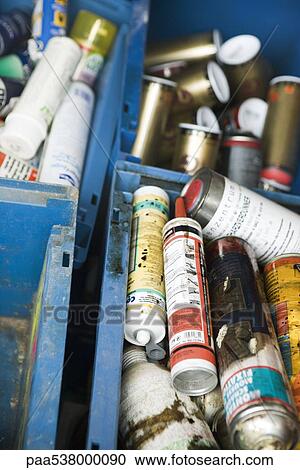 Stock Image - Discarded aerosol cans, full frame. Fotosearch