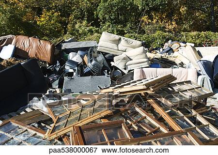 Discarded windows and furniture in large junk heap View Large Photo Image Stock Photo - Discarded windows and furniture in large junk heap. Fotosearch
