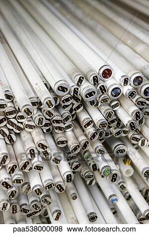 Stock Photo - Fluorescent light bulbs, full frame. Fotosearch