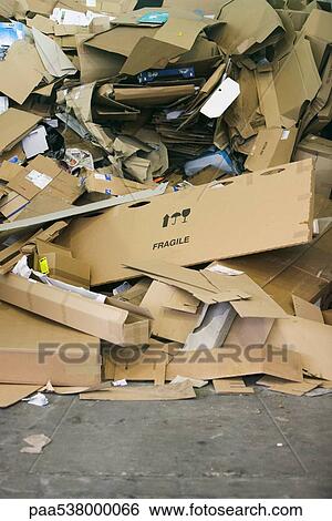 Heap of flattened cardboard boxes View Large Photo Image Stock Photograph - Heap of flattened cardboard boxes. Fotosearch