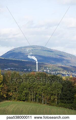 Rural landscape with smoke stack in distance View Large Photo Image Stock Image - Rural landscape with smoke stack in distance. Fotosearch