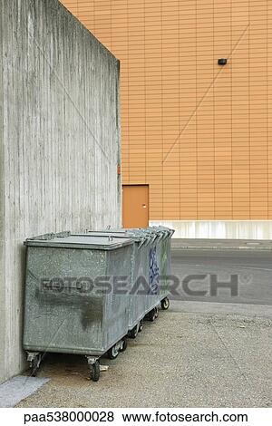 Trash bins in alleyway View Large Photo Image Stock Photo - Trash bins in alleyway. Fotosearch