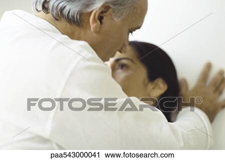 Stock Image - Mature couple embracing. Fotosearch