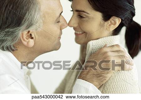 Mature couple rubbing noses View Large Photo Image Stock Image - Mature couple rubbing noses. Fotosearch