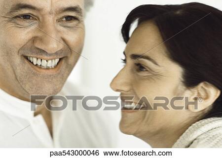 Mature couple together, smiling View Large Photo Image Stock Photograph - Mature couple together, smiling. Fotosearch