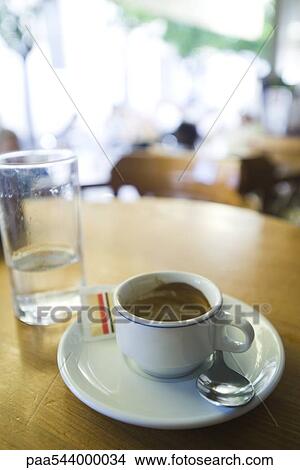 Dirty coffee cup left on cafe table View Large Photo Image Picture - Dirty coffee cup left on cafe table. Fotosearch