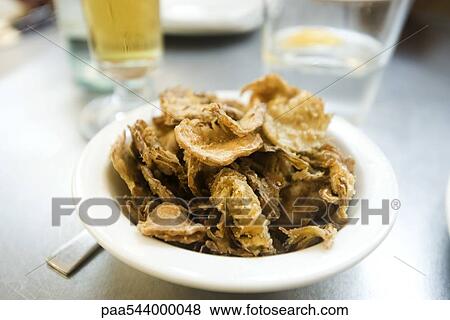 Fried potato slices View Large Photo Image Stock Photo - Fried potato slices. Fotosearch