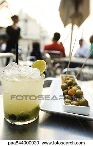Stock Image - Mojito and olive tray. Fotosearch