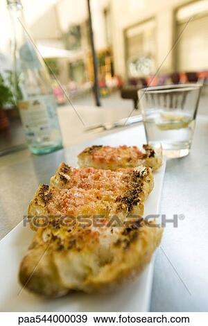 Slices of focaccia bread View Large Photo Image Stock Photo - Slices of focaccia bread. Fotosearch
