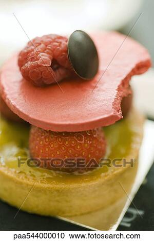 Tart topped with fresh berries View Large Photo Image Stock Image - Tart topped with fresh berries. Fotosearch